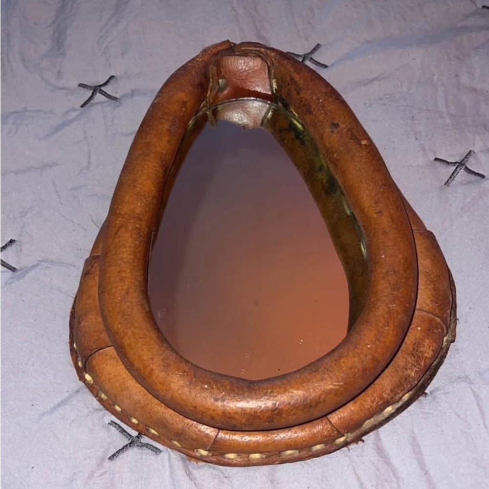 Antique Leather horse collar mirror.